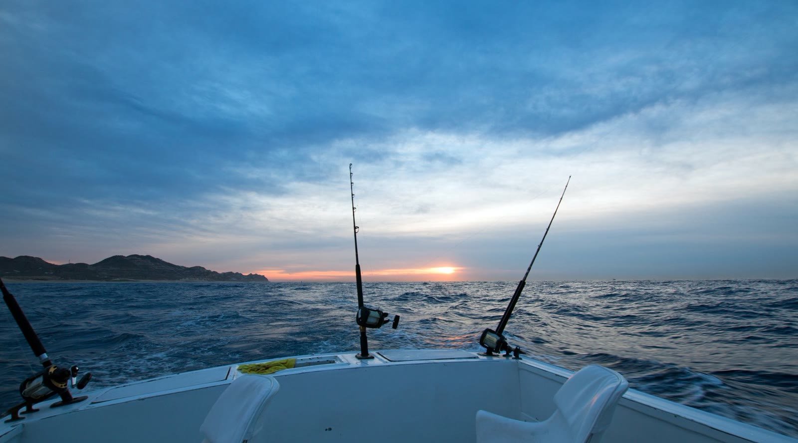 Sport fishing at sunrise off the Cabo coastline